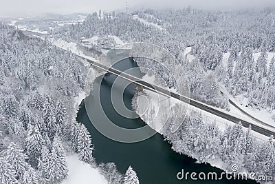 View from above on motorway bridge over the dark blue river Lech Stock Photo