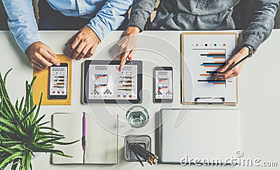 View from above.One on one meeting.Businessmen sitting at desk and working. Stock Photo