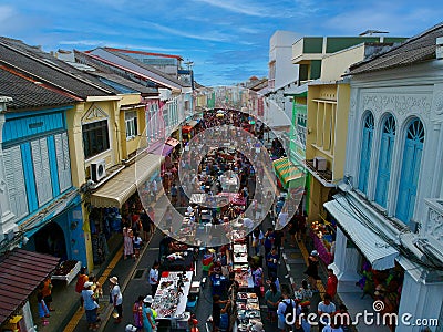 View from above Tallang Rd Sunday night market in old phuket town Thailand. Busy with people amongst the old historical houses Editorial Stock Photo