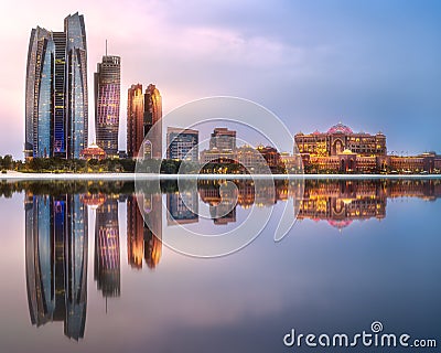 View of Abu Dhabi Skyline at sunrise, UAE Stock Photo