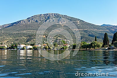 View of Small Fishing Village From Gulf of Corinth Bay, Greece. Stock Photo
