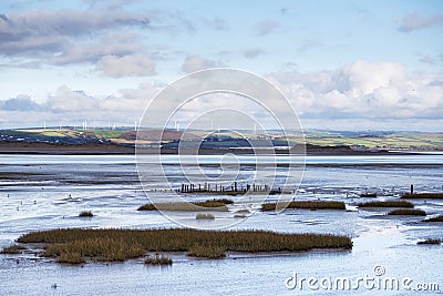 View across estuary from Northam Burrows Country Park, North Devon, England, light and shade. Stock Photo