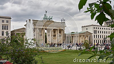 Unique view of the Brandenburg Gate with lots of Tourist in Berlin Germany. Editorial Stock Photo