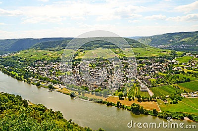 View across river Moselle to Puenderich village - Mosel wine region in Germany Stock Photo