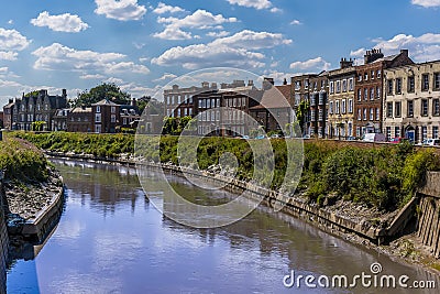 A view across the River Nene towards the North Brink in Wisbech, Cambridgeshire Stock Photo