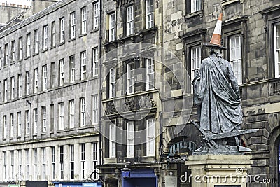 View of Adam Smith statue in Royal Mile street Edinburgh Editorial Stock Photo