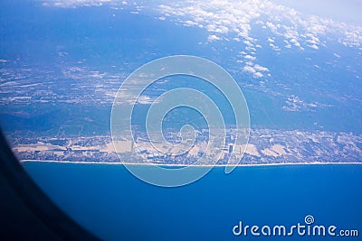 View From the aircraft window in the blue sky Stock Photo