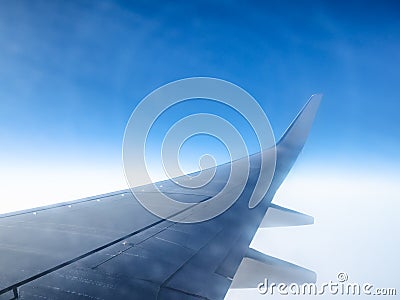 View of aircraft wing and halo phenomena Stock Photo