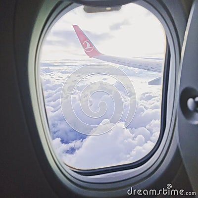 view from the airplane window on feather clouds Editorial Stock Photo