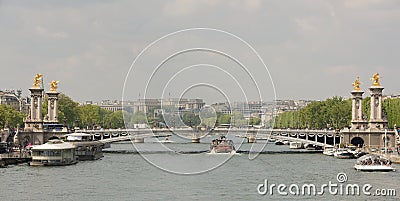 View of the Alexander lll Bridge . By the embankments are movin Editorial Stock Photo