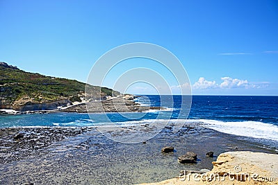 View along the Marsalforn coastline, Gozo. Stock Photo