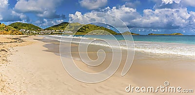 A view along Orient beach in St Martin towards the headland Stock Photo