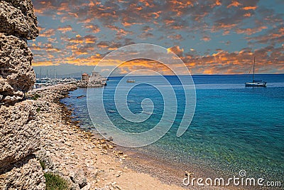 View along of Pl. Neoriou, Mandraki Marina Port, Rhodes island, Greece, from the ramparts of Saint Paul Gate Stock Photo