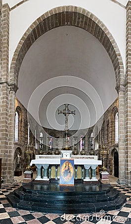 View of the altar in the Abbey Sainte-Croix in Quimperle in Brittany Editorial Stock Photo