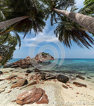 Corol reef rock landscape with a pure blue sky and a green clear water Stock Photo