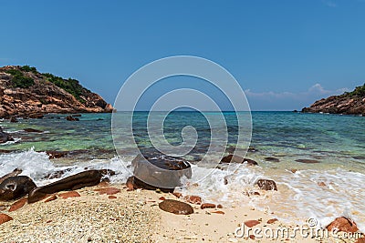 Corol reef rock landscape with a pure blue sky and a green clear water Stock Photo