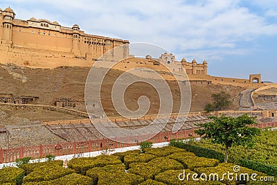 View of Amber fort and palace from Kesar Kyari Bagh garden on Maotha Lake. Rajasthan. India Stock Photo