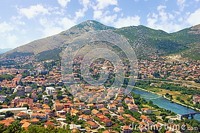 View of ancient city of Trebinje and Trebisnjica river on sunny summer day. Bosnia and Herzegovina Stock Photo