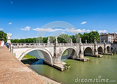 View from the ancient embankment Tiber in Roma near of the bridge and castle of Angels. Roma, Italy Editorial Stock Photo