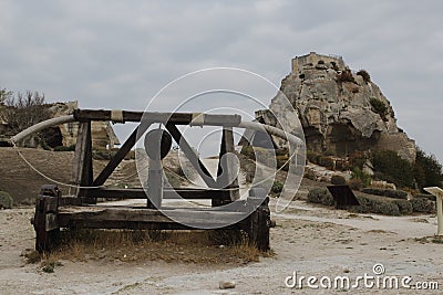 Les Baux-de-Provence, France - OCTOBER 21, 2017: View of the ancient siege weapon against the medieval castle Editorial Stock Photo