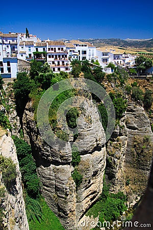 View on ancient village Ronda located precariously close to the edge of a cliff in Andalusia, Spain Stock Photo
