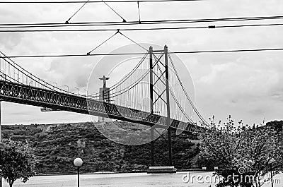 View of 25 April Bridge on River Tagus Editorial Stock Photo