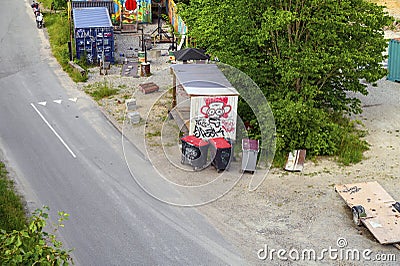 View of an area with a container, a shed and some trash cans in Aarhus, Denmark on June 23 2020 Editorial Stock Photo