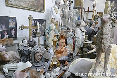 View of assorted religious statues in an old workshop in Lecce, Italy Editorial Stock Photo