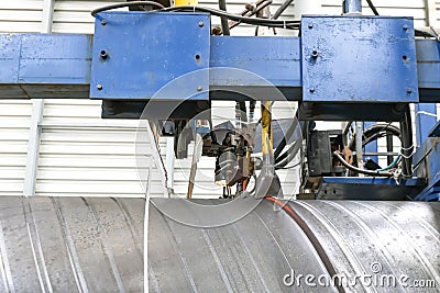 View of the automatic ultrasonic device for spiral welded pipe manufacturing controls. Stock Photo