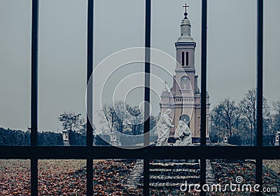 A view through the bars of the Gothic scene. II Stock Photo