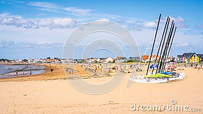 View of the beach of Chatelaillon-Plage during summer 2021 with many tourists and sunny blue sky in ChÃ¢telaillon Plage France Editorial Stock Photo