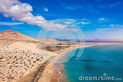View on the beach Sotavento with golden sand and crystal sea water of amazing colors on Costa Calma on the Canary Island Stock Photo