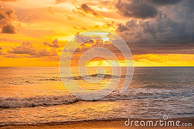 View of Beautiful glorious golden sunset and golden hour above the sea in evening Stock Photo