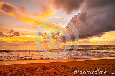 View of Beautiful glorious golden sunset and golden hour above the sea in evening Stock Photo