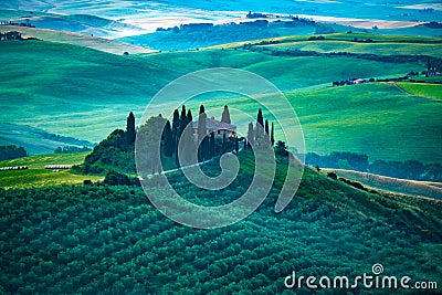 View of beautiful green hilly landscape in the early morning Stock Photo
