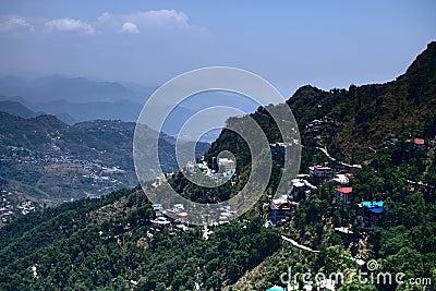 View of beautiful hill town a city in the mountains full of colourful houses and very vibrant scenery of houses in mountains in in Stock Photo