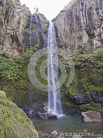 View of the beautiful and tall waterfall in Salto da Farinha, Sao Miguel, Azores, Portugal Stock Photo