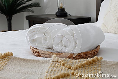 bed decor, rolled bath towel Stock Photo