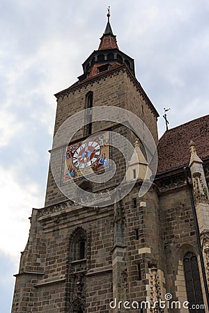 View of the bell tower of the historic gothic Black Church in the city of Brasov. Transylvania. Romania Stock Photo