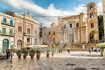 View of Bellini Square with tourists visiting the Santa Maria dell`Ammiraglio Church known as Martorana Church in Palermo. Editorial Stock Photo