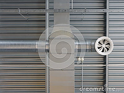A close-up of a ceiling in a huge warehouse. Inside bright view of iron structure construction as a background. Stock Photo