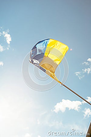 View from below of peacefully waving Flag of Ukraine Stock Photo