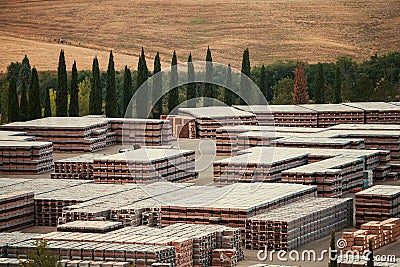 A view of a big industry in a field in Val d`Orcia, Tuscany Stock Photo