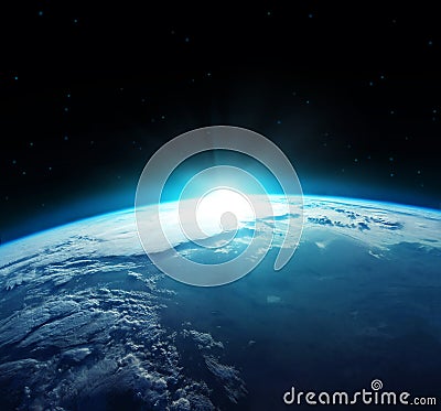 View of blue planet Earth with sun rising from space. Elements of this image furnished by NASA Stock Photo