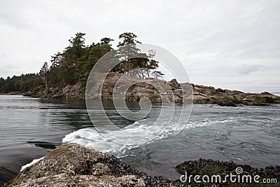 View of Boat Passage from Winter Cove Marine Park anchorage, Vancouver Island, Canada Stock Photo