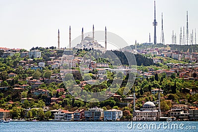 View from the Bosphorus to the largest mosque in Turkey, Grand CamlÄ±ca Mosque, and the CamlÄ±ca TRT Television Tower Stock Photo