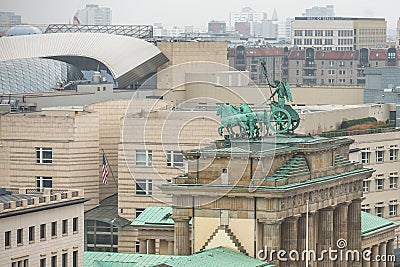 View of the Brandenburg Gate (Brandenburger Tor) is very famous architectural monument in the heart of Berlin's Mitte Editorial Stock Photo