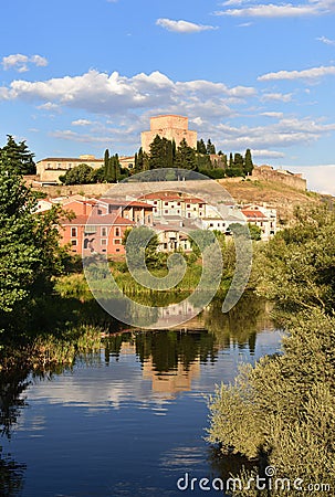 View of bridge and the Castle of Henry II of Castile 14th century and River Agueda, Stock Photo