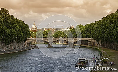 Bridge on the river Tiber and dome of St. Peter`s Basilica in Rome, Italy Stock Photo