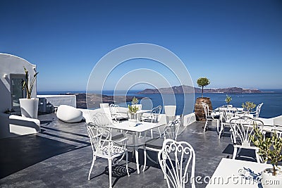 View of the Caldera from the terrace cafe, Fira, Santorini Stock Photo